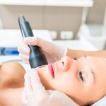 Cavitation treatment on the preaty womans face